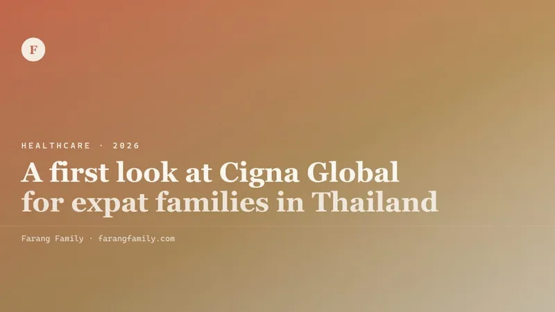 An open insurance policy booklet next to a child's vaccination record on a Bangkok kitchen table in afternoon light.